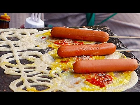 بالفيديو تعرّف على طعام الشارع في تايلاند