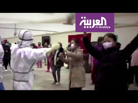 شاهد مرضى صينيون يتغلبون على فيروس كورونا بالغناء والرقص